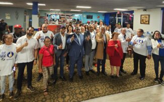 Tony Peña juramenta en PRM a peledeístas de la diáspora