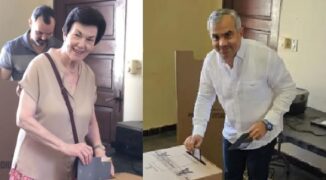 Sonia Guzmán e Iván Hernández sufragaron en recinto de la UASD de Santiago