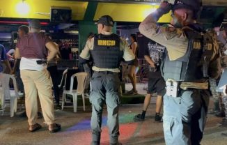 Detienen 3, ocupan armas, drogas en allanamientos en Santiago